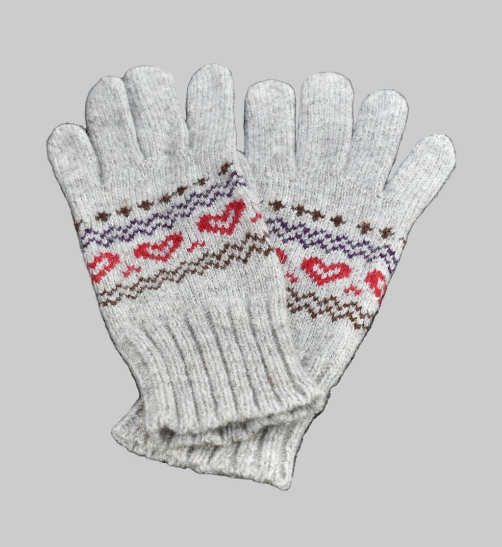Pair of gray gloves with heart pattern on a black background