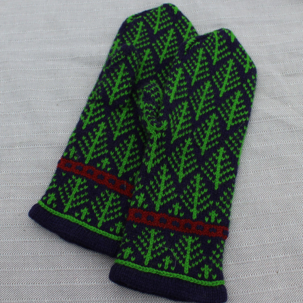 Green and black patterned gloves on a gray background