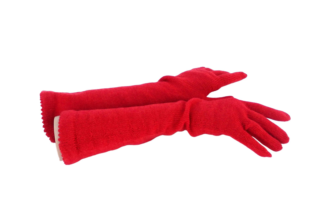 Pair of red gloves on a white background