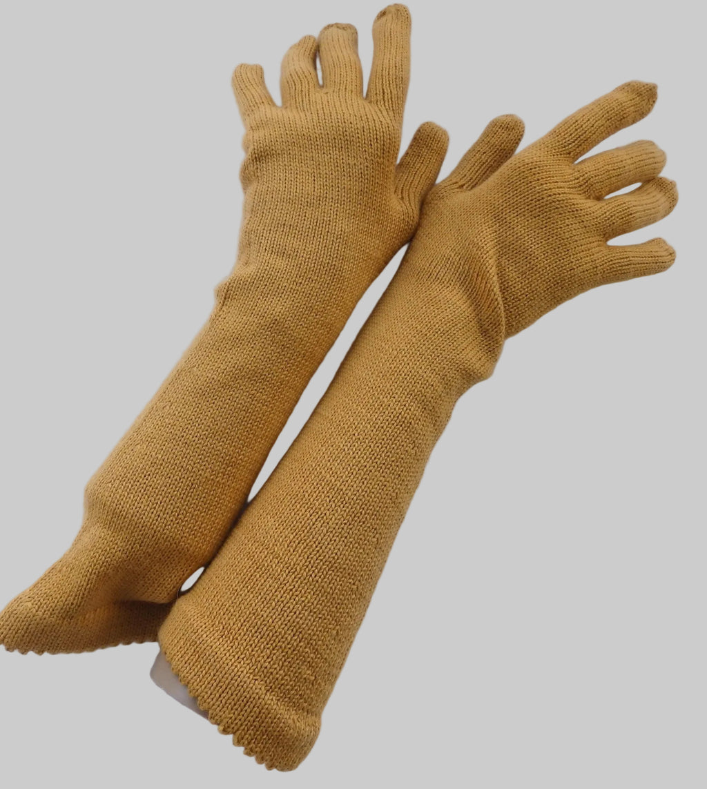Pair of mustard yellow gloves on a white background
