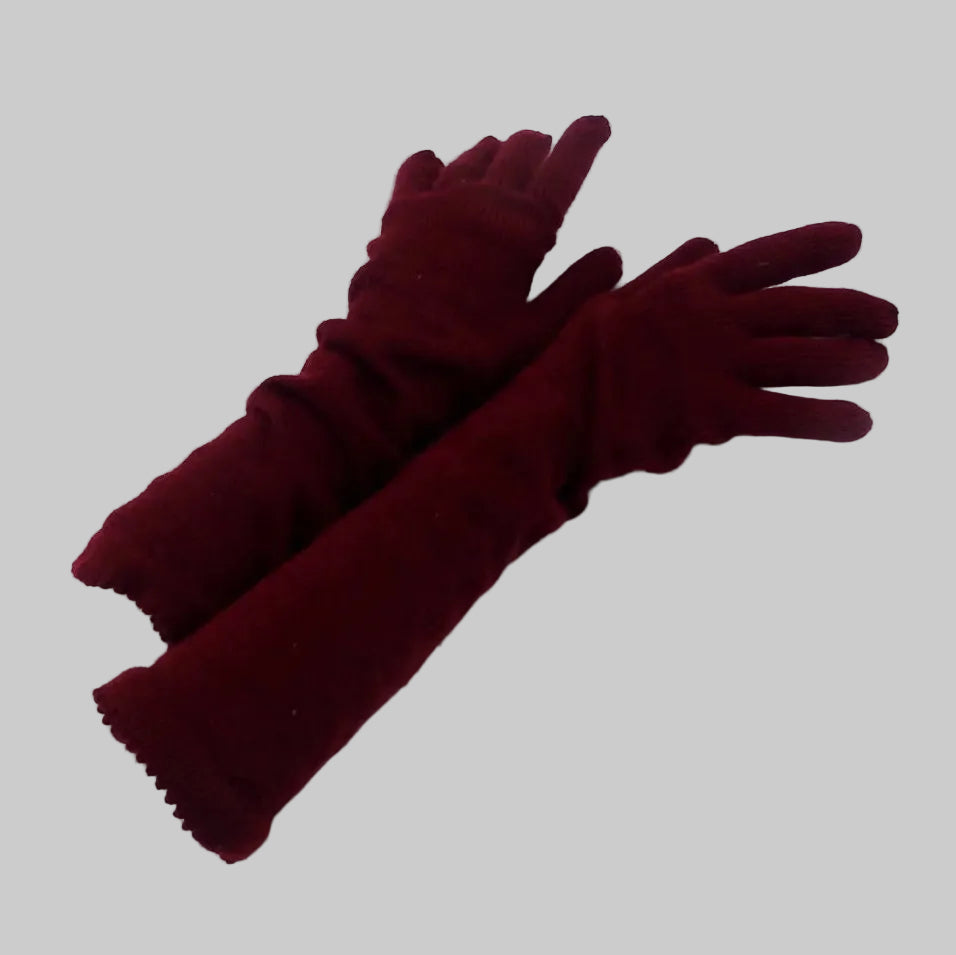 Pair of maroon gloves on a white background