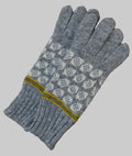 Gray knitted glove with a patterned palm on a black background
