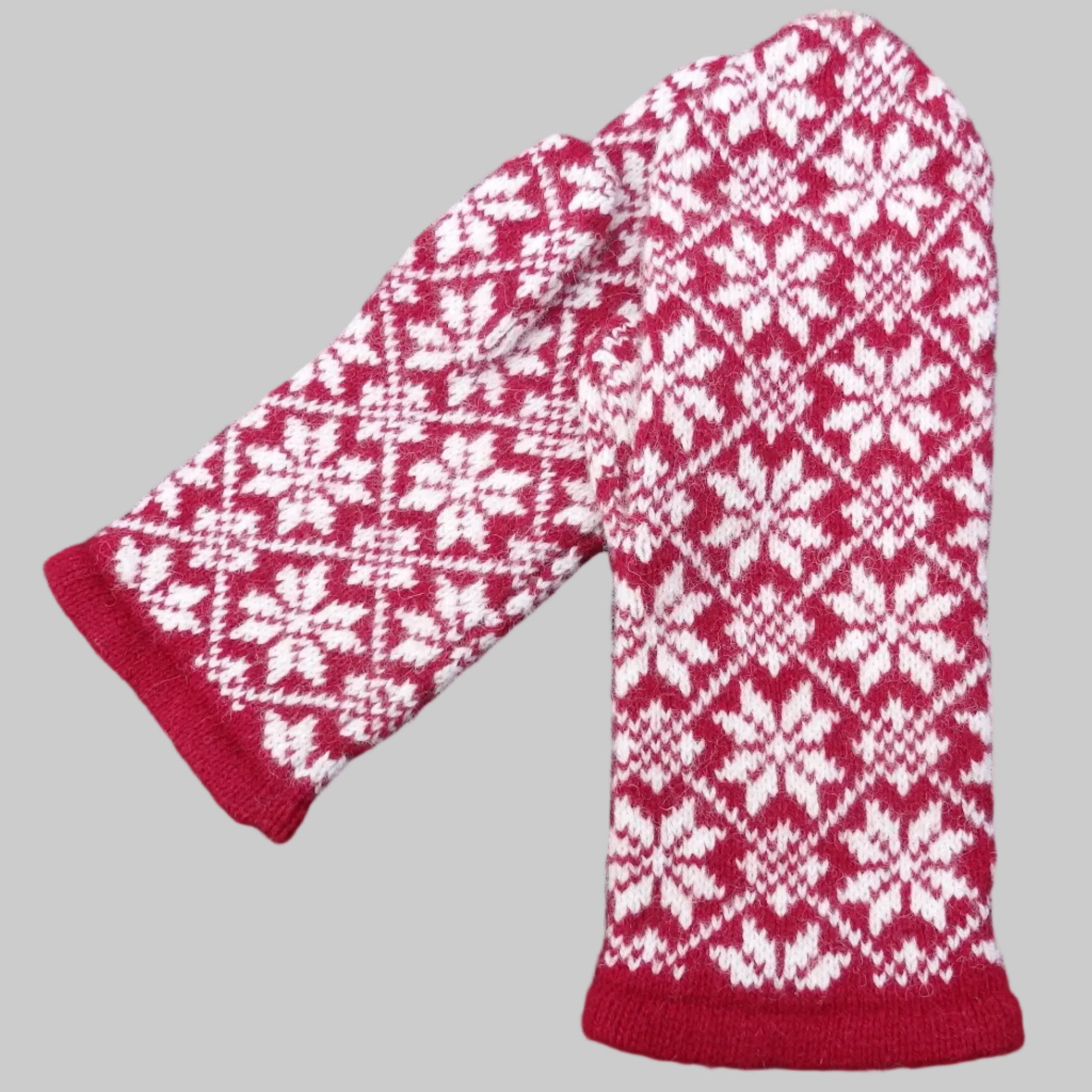 Red and white patterned mittens 