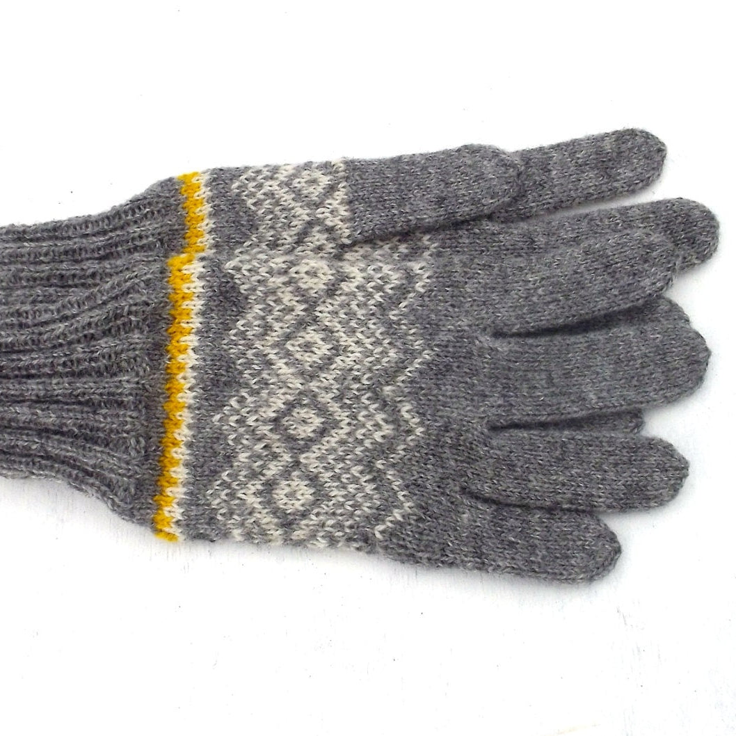 Gray knit glove with a patterned cuff on a white background