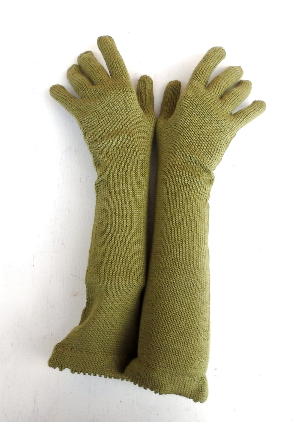 Pair of green gloves on a white background