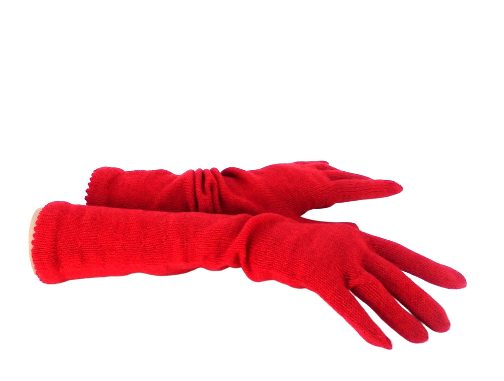 Pair of red gloves on a white background