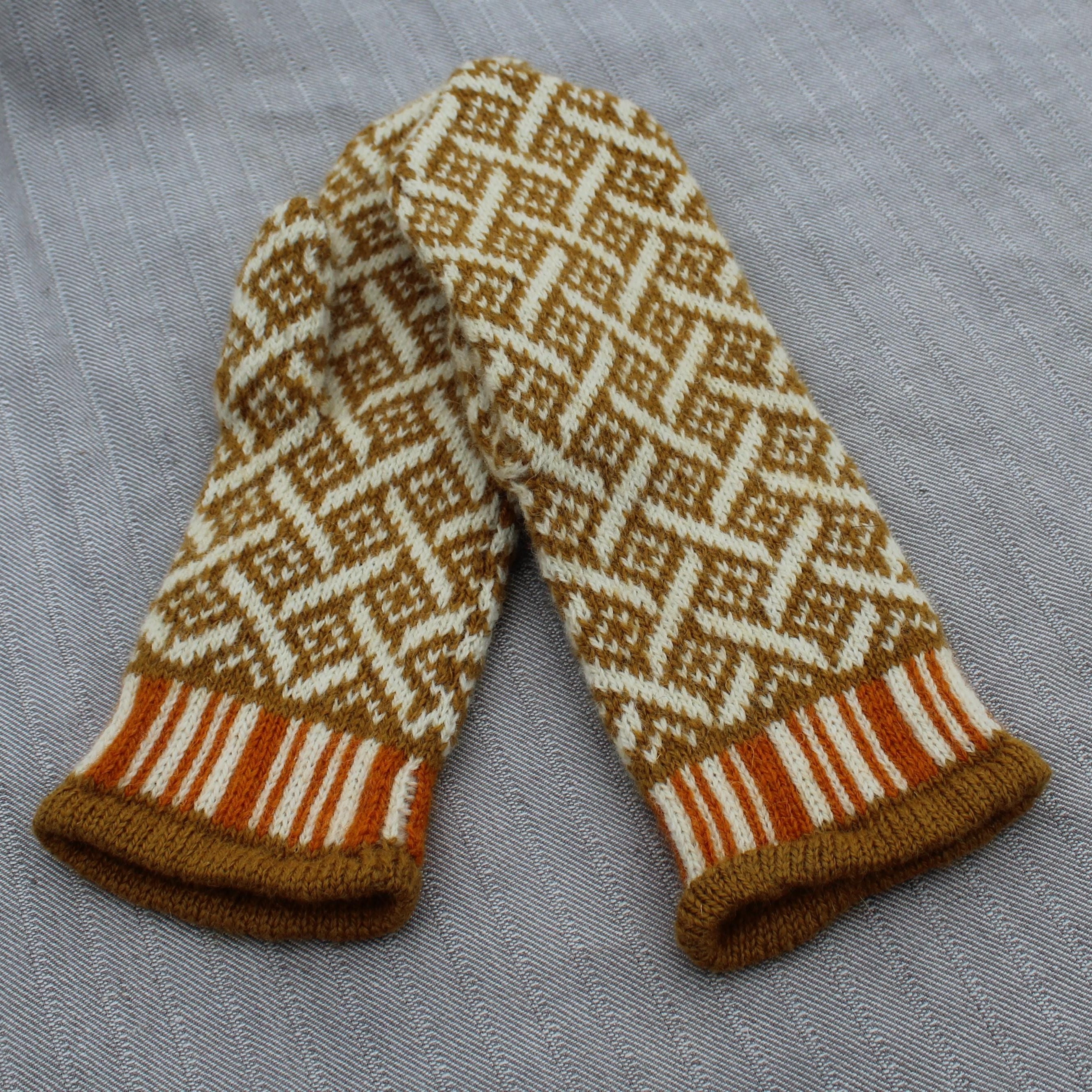 Knitted scarf with geometric pattern on a textured fabric background