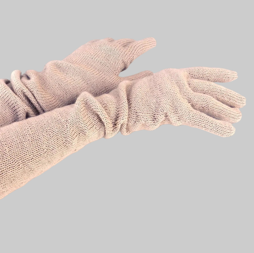 Pair of beige gloves on a white background