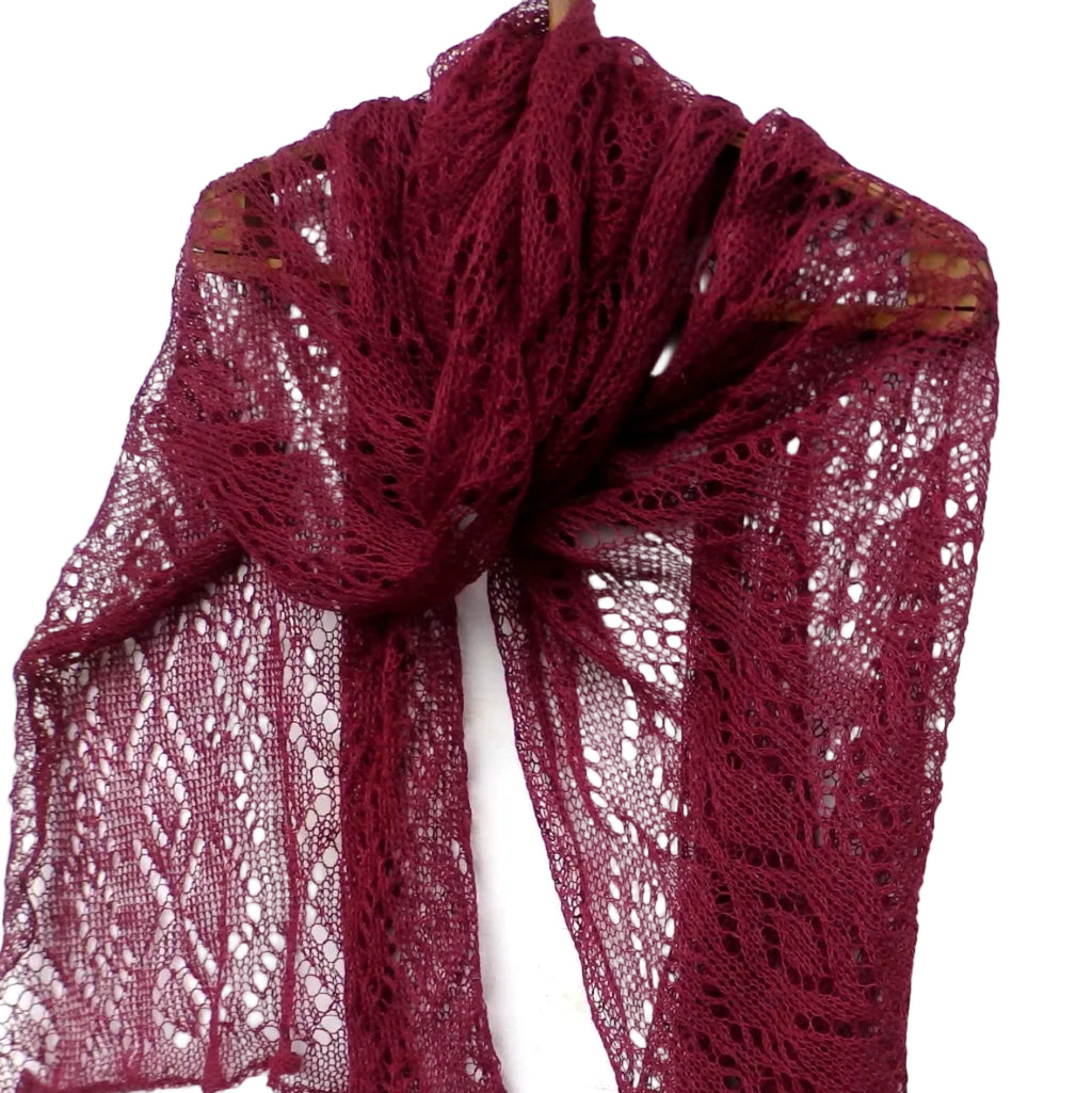 Red lace scarf on a white background