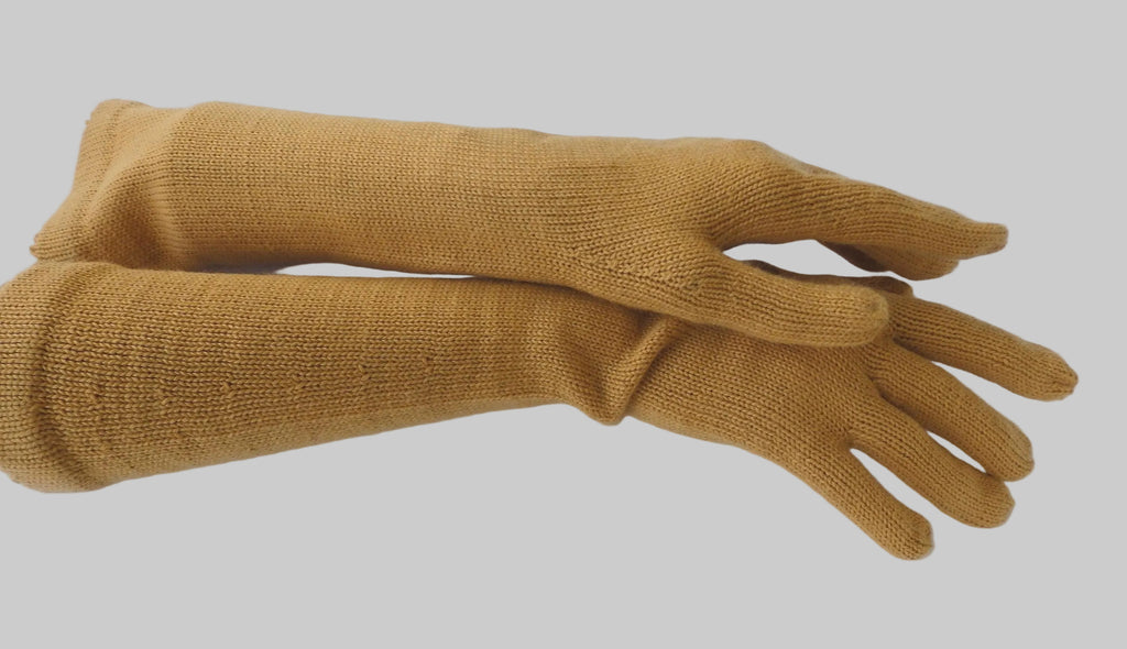 Pair of mustard yellow gloves on a white background