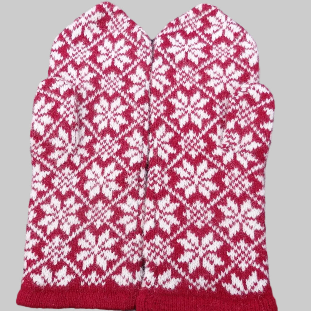 Red and white patterned mittens 