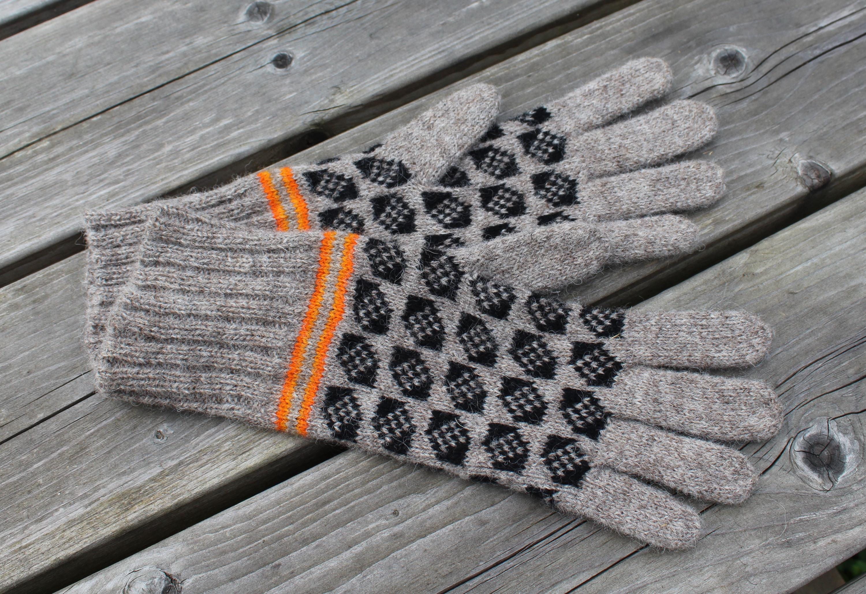 Textured glove with checkered pattern on a wooden surface