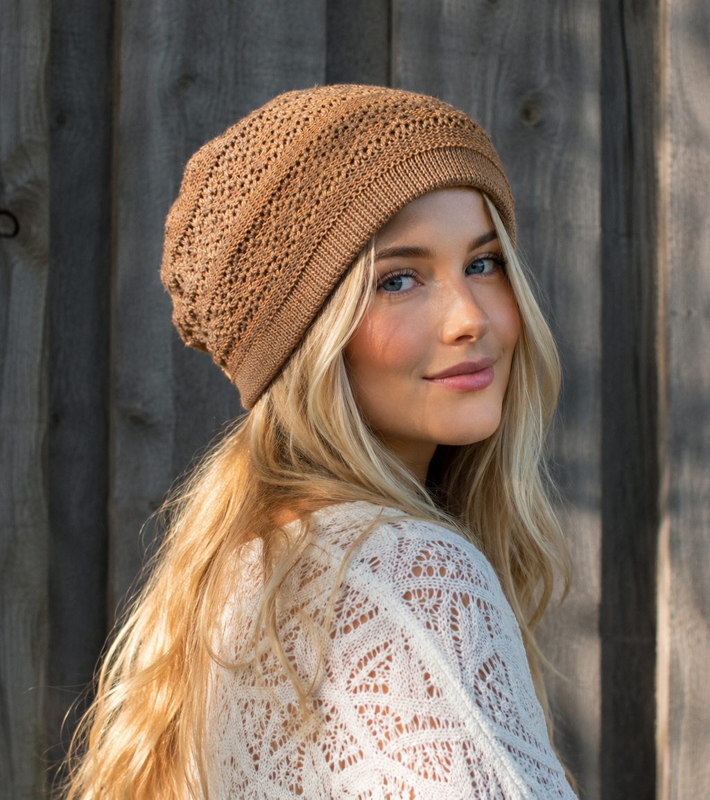 Woman wearing a brown knitted beanie against a wooden background