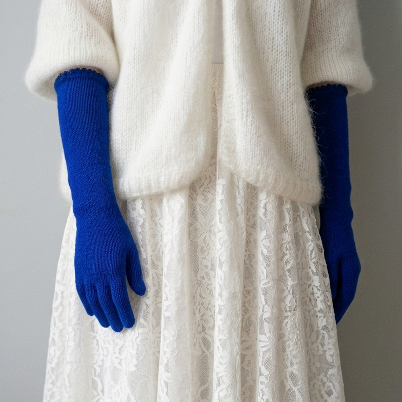White coat, white skirt, and blue gloves on a gray background