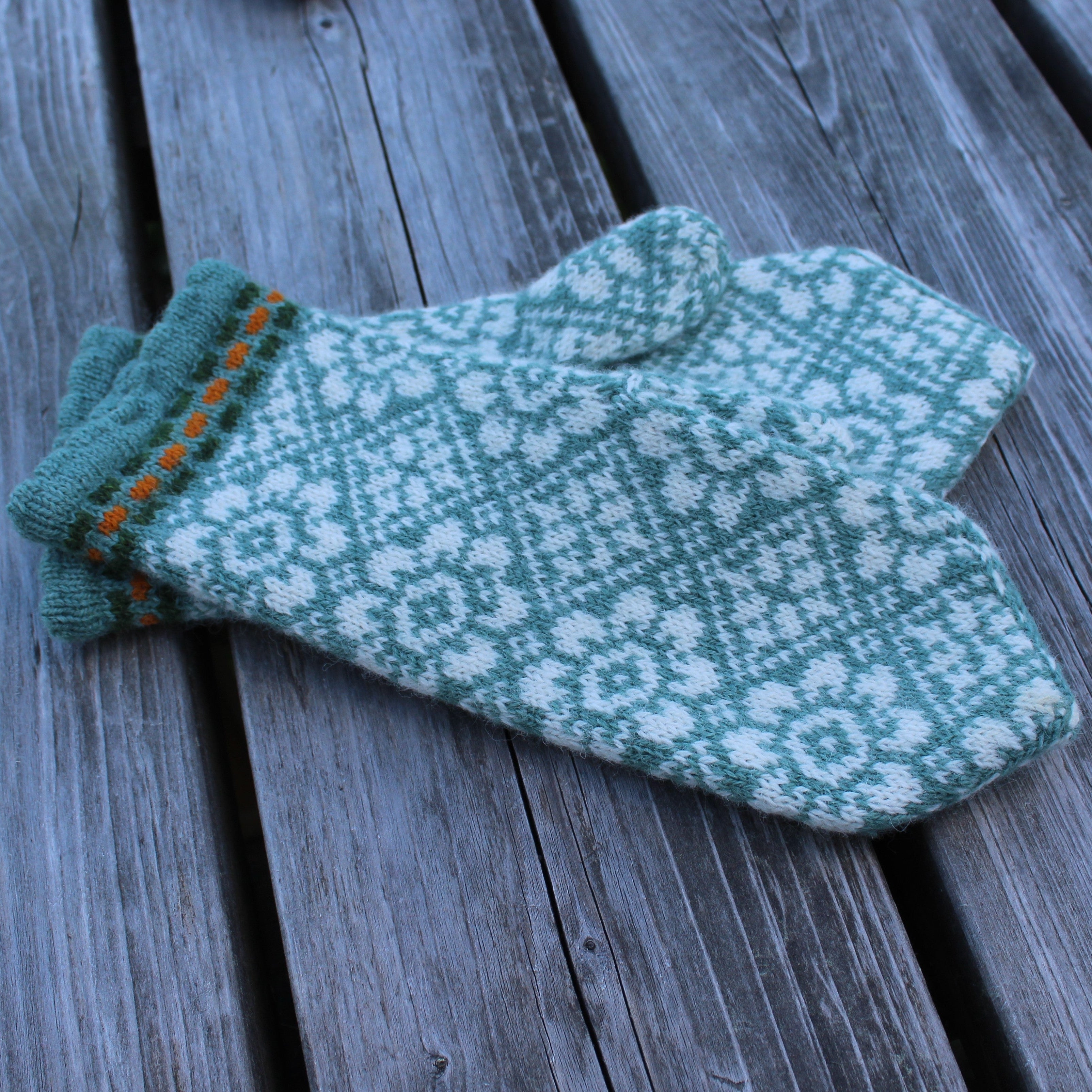 knit green white wool mittens