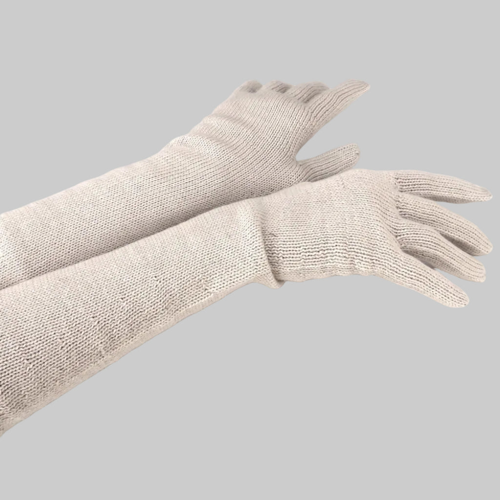 Pair of beige gloves on a white background