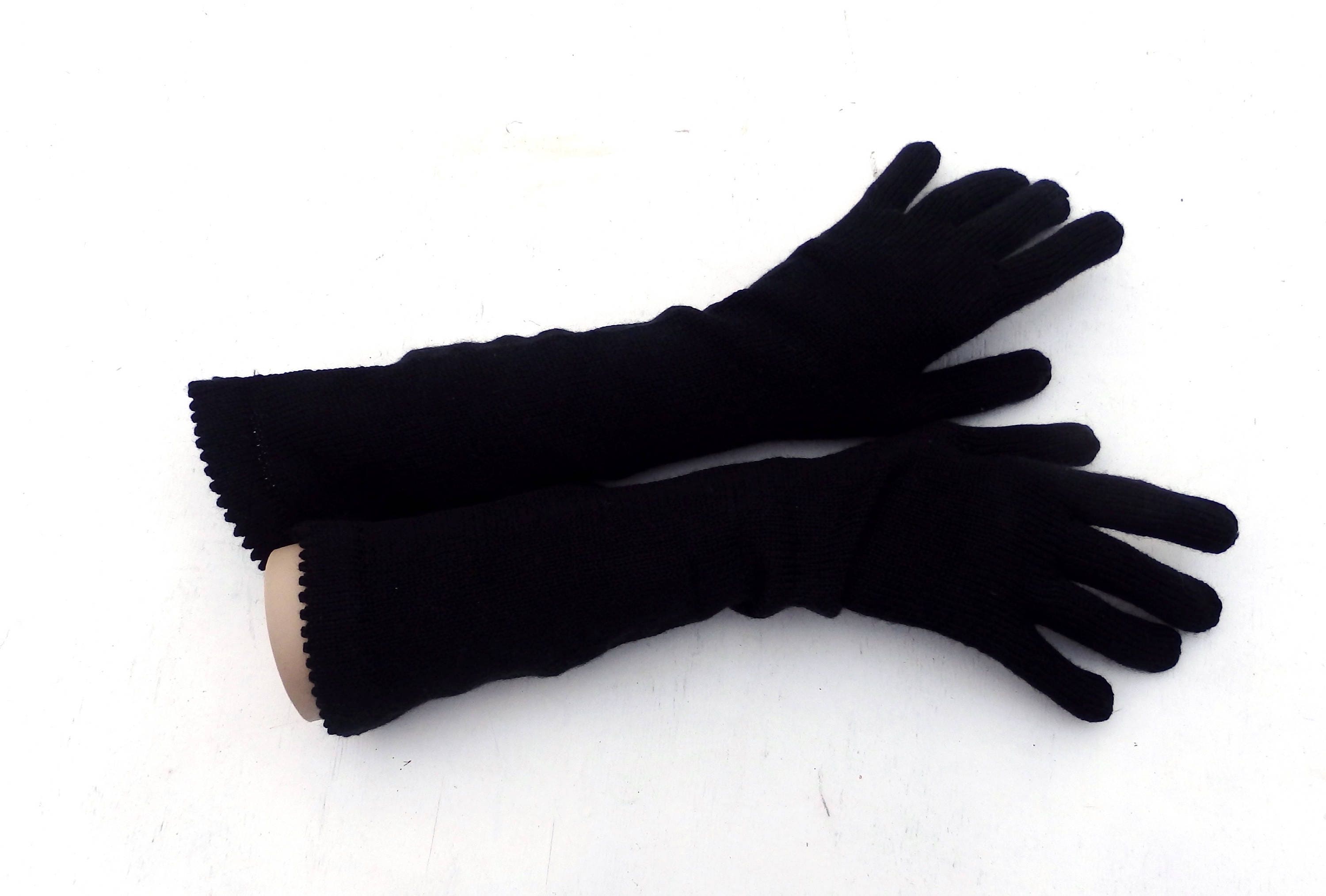 Pair of black gloves on a white background