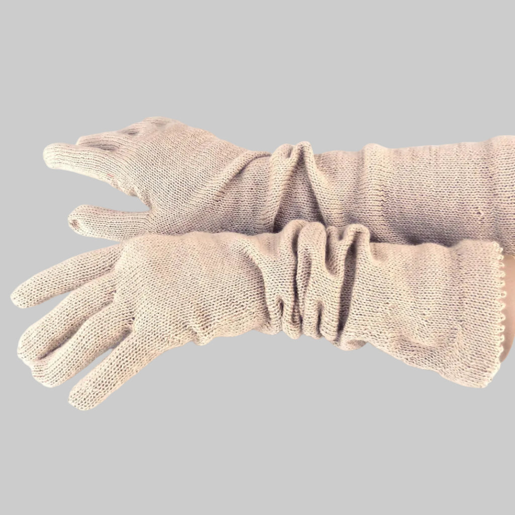 Pair of beige compression gloves on a white background