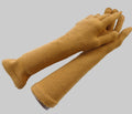 Pair of mustard yellow gloves on a white background