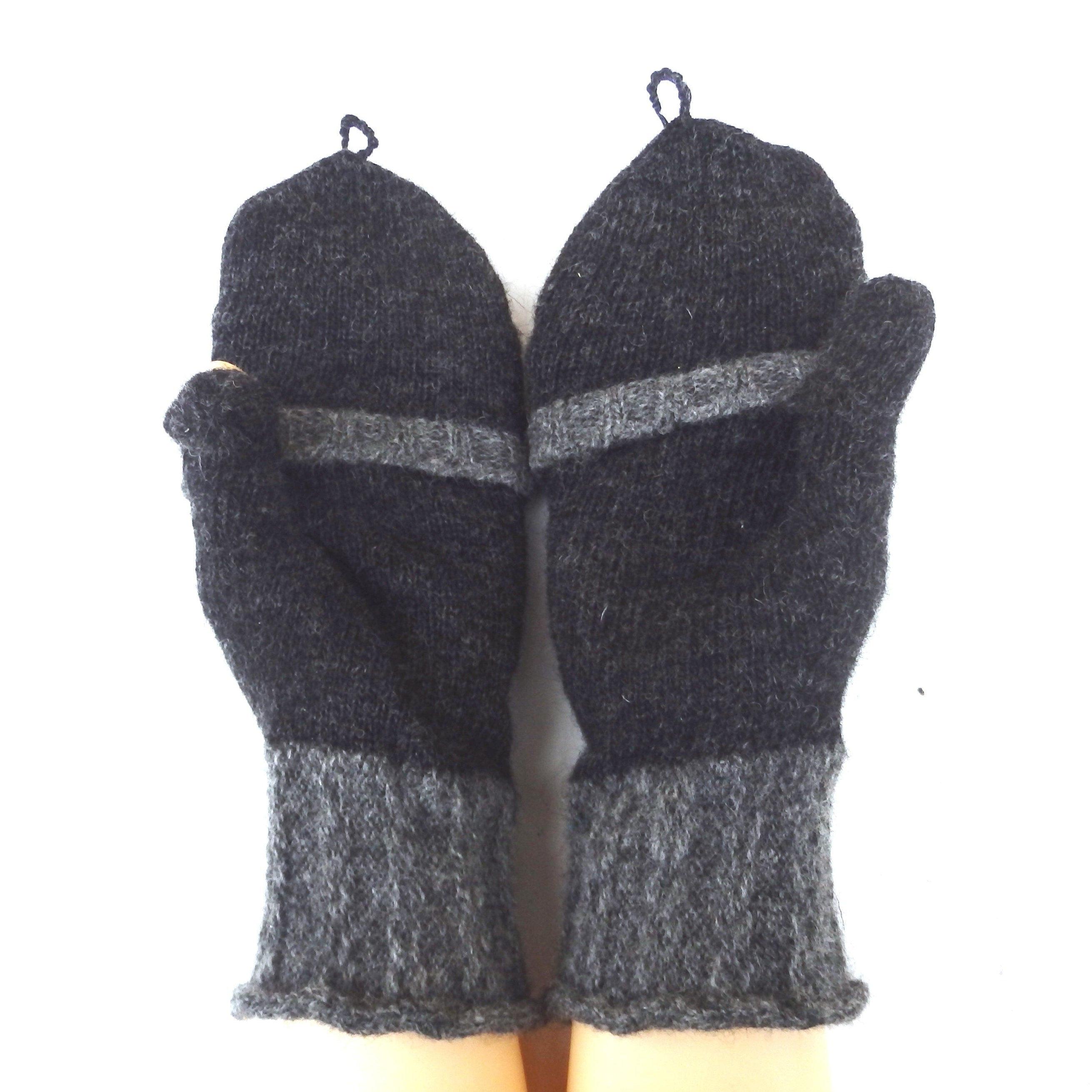 Pair of gray knitted mittens on a white background