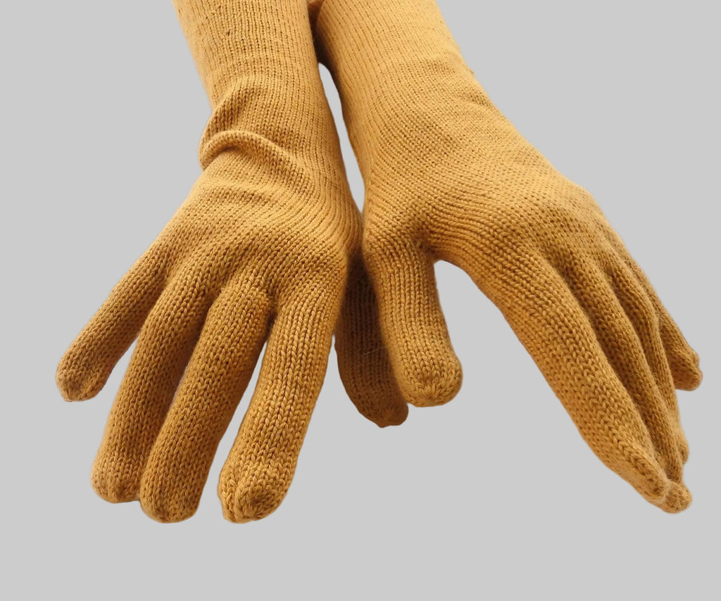 Pair of mustard yellow gloves on a white background