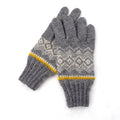 Pair of gray gloves with a patterned design and yellow accents on a white background
