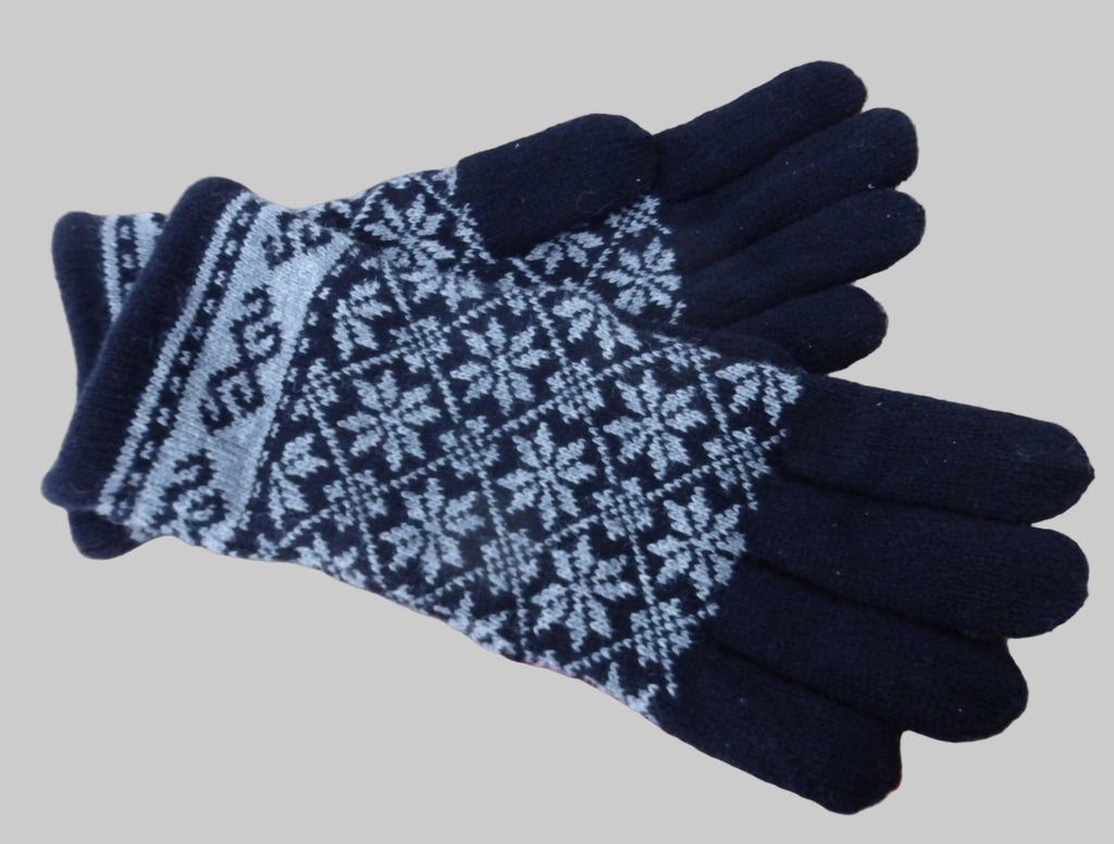 Pair of gloves with a blue and white pattern on a light wooden surface