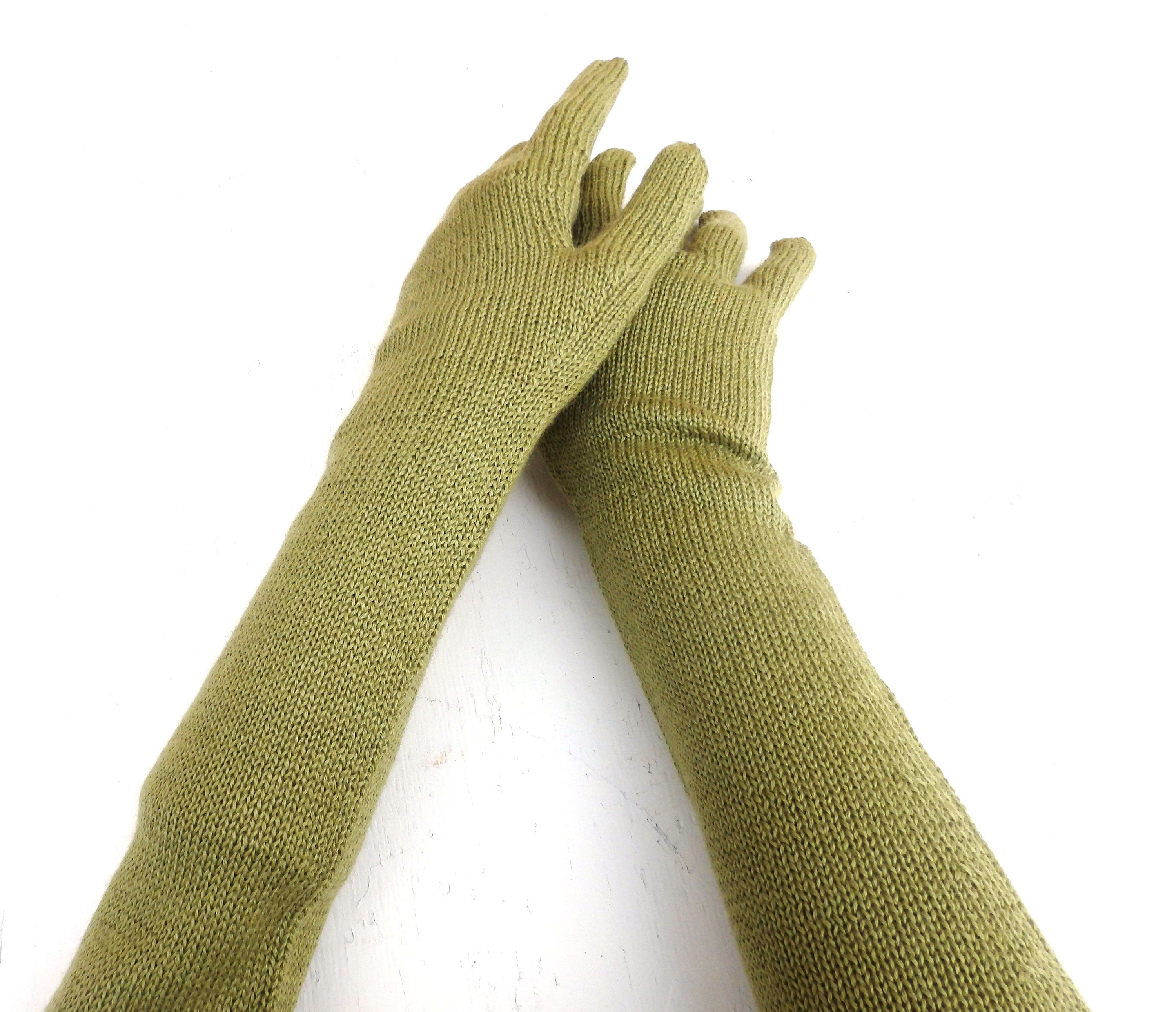 Pair of green gloves on a white background