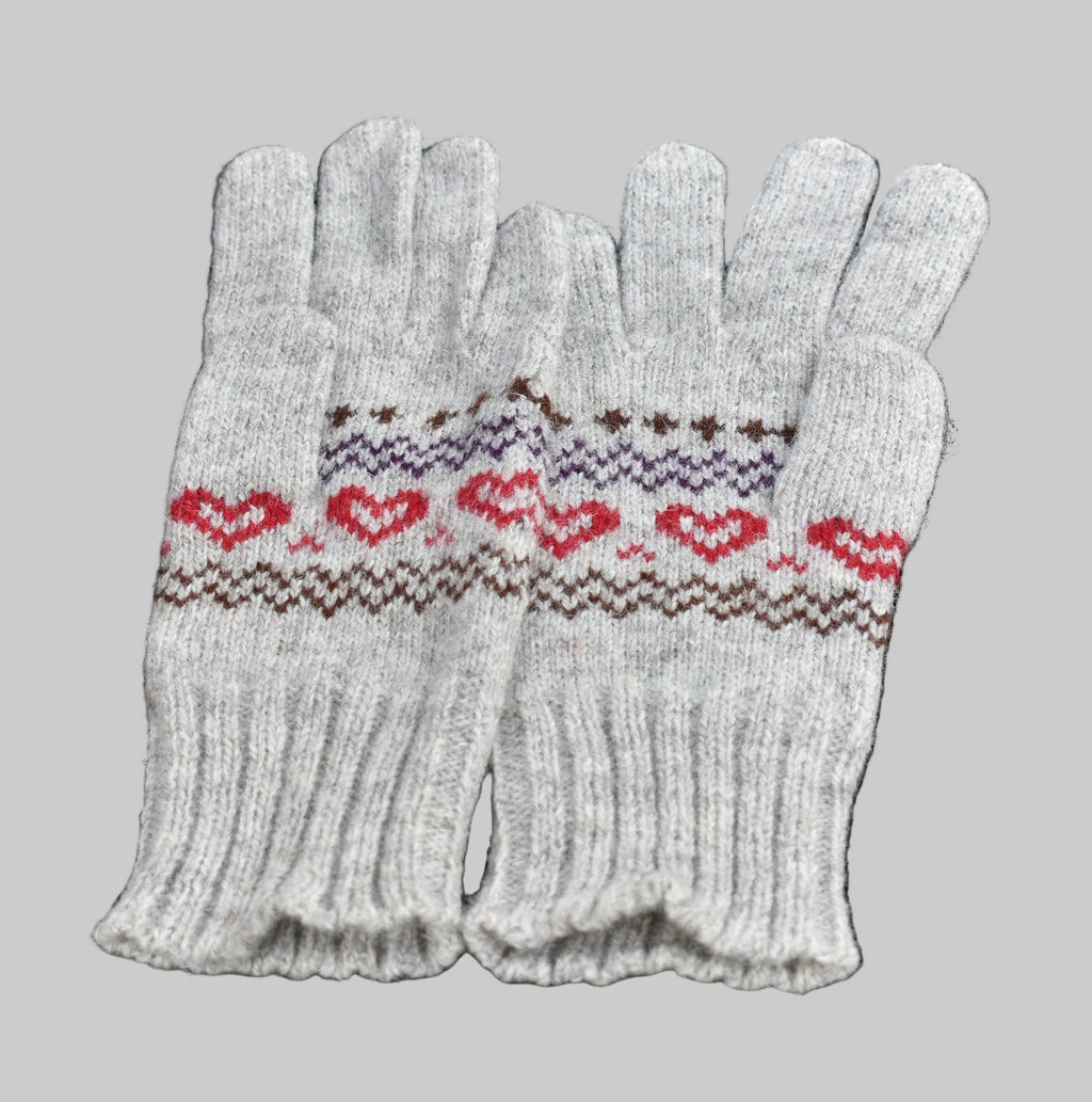 Pair of white gloves with red and brown pattern on a black background